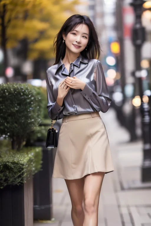 A woman walking downtown. She is 40 years old. She has nothing in her hand. →Her hair is brushed back by her ear. Gray shiny blouse. Long beige skirt. White high heels. Full body. Realistic photo.