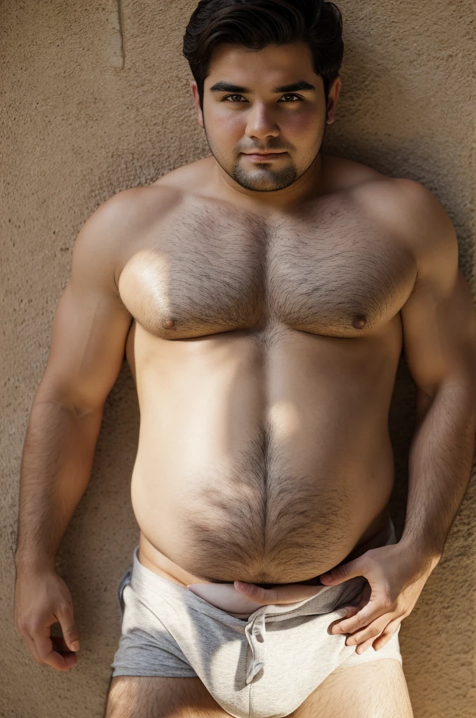 Cute boy with a round bloated belly.