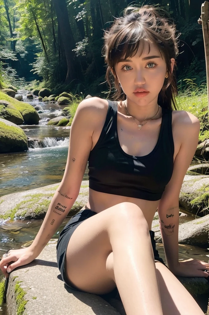 Miley Cyrus is beautiful, with long straight hair, wearing a cropped tank top and shorts, sitting seductively on the banks of streams, rocks, and forests.