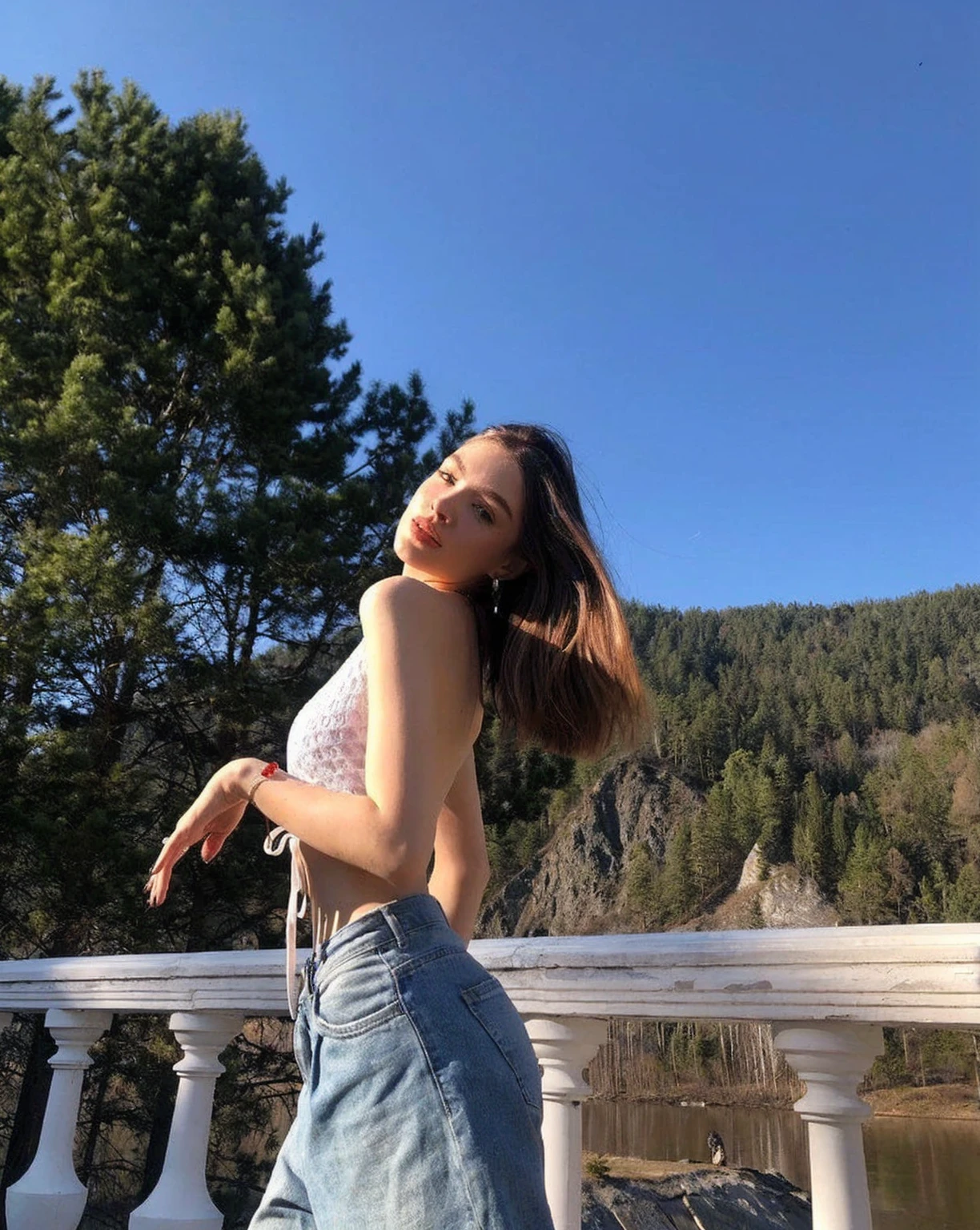 A woman in a white top and jeans stands on the railing, Anna Nikonova aka Newmilky, Portrait of Sophie Mudd, Instagram Models, Dasha Taran, Casual posture, Alina Ivanchenko, Julia Lamova&#39;s style, Bella Boachi, Profile picture, In the mountains, 18 years old, Victoria Gavrilenko, User Photos
