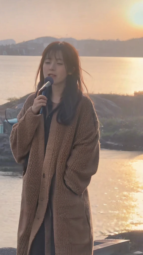 A Japanese girl in her 20s singing during sunset