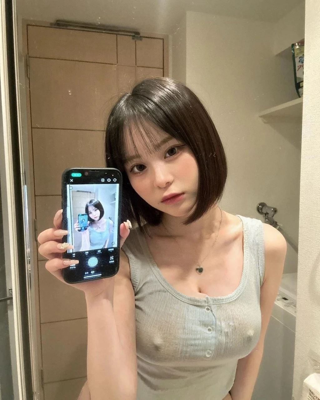 8K, high resolution, masterpiece, photorealistic,Tight T-shirt,A T-shirt that shows off your bust, Large Breasts, Big Tits, Patsy T-shirt, Pink small t-shirt, Accentuates the bust line clearly、 Accentuate your breasts, Very swollen breasts, K-Cup, Tシャツから胸の形が分かるほどにLarge Breasts,There are two nipples、Big cleavage、Exposing cleavage