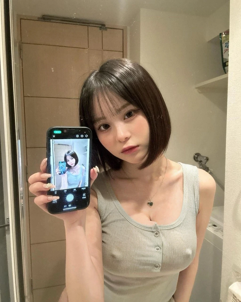 8K, high resolution, masterpiece, photorealistic,Tight T-shirt,A T-shirt that shows off your bust, Large Breasts, Big Tits, Patsy T-shirt, Pink small t-shirt, Accentuates the bust line clearly、 Accentuate your breasts, Very swollen breasts, K-Cup, Tシャツから胸の形が分かるほどにLarge Breasts,There are two nipples、Big cleavage、Exposing cleavage