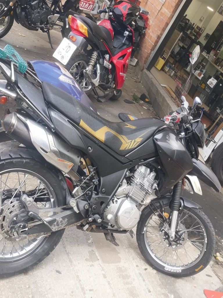 Add the linear adhesives that go on the plastic parts of the motorcycle