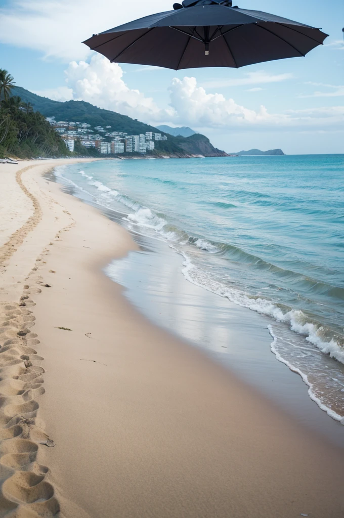 A beach and two umbrellas in the distance