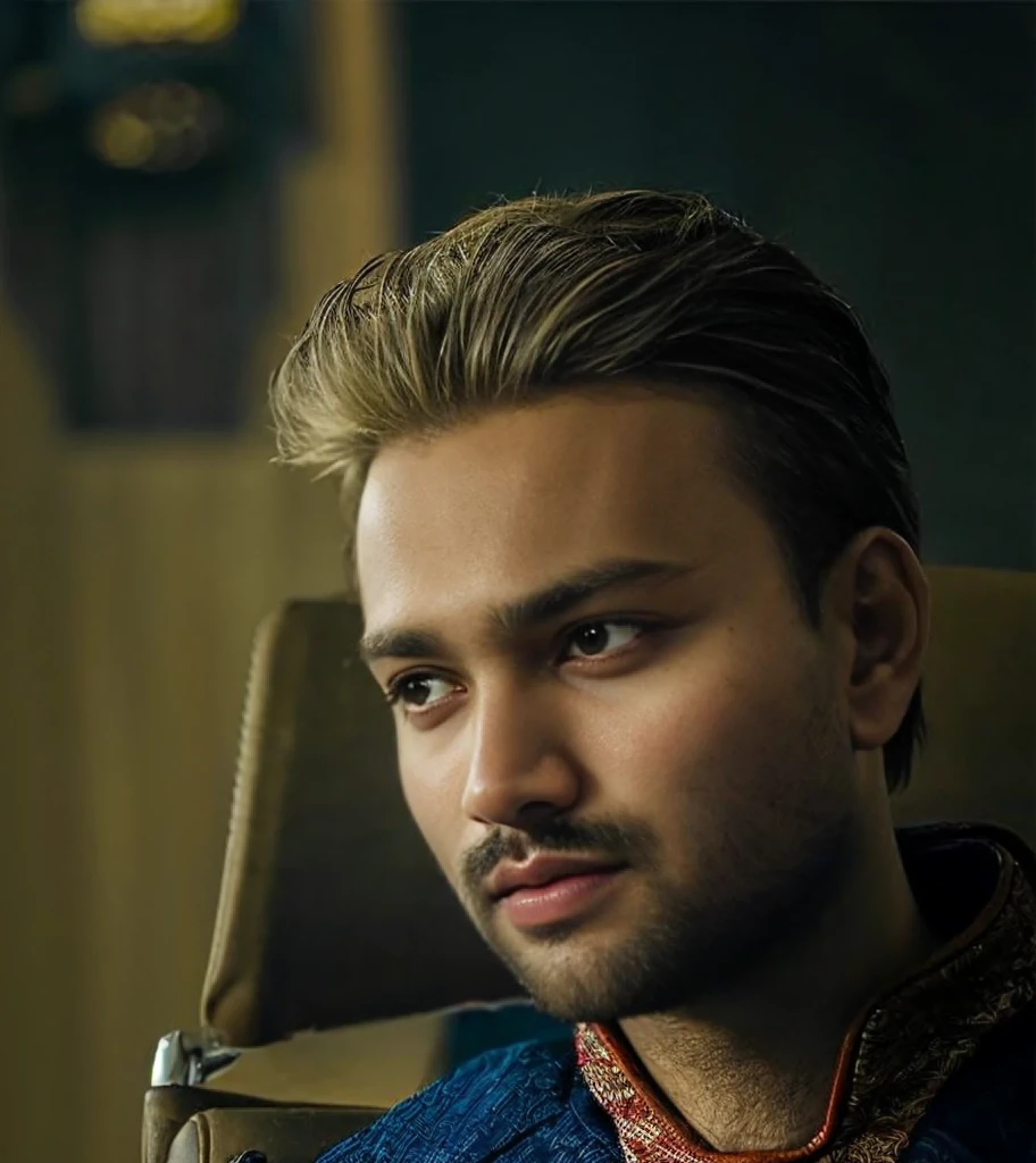 A beautiful young bearded man with highly detailed skin.black hair.
