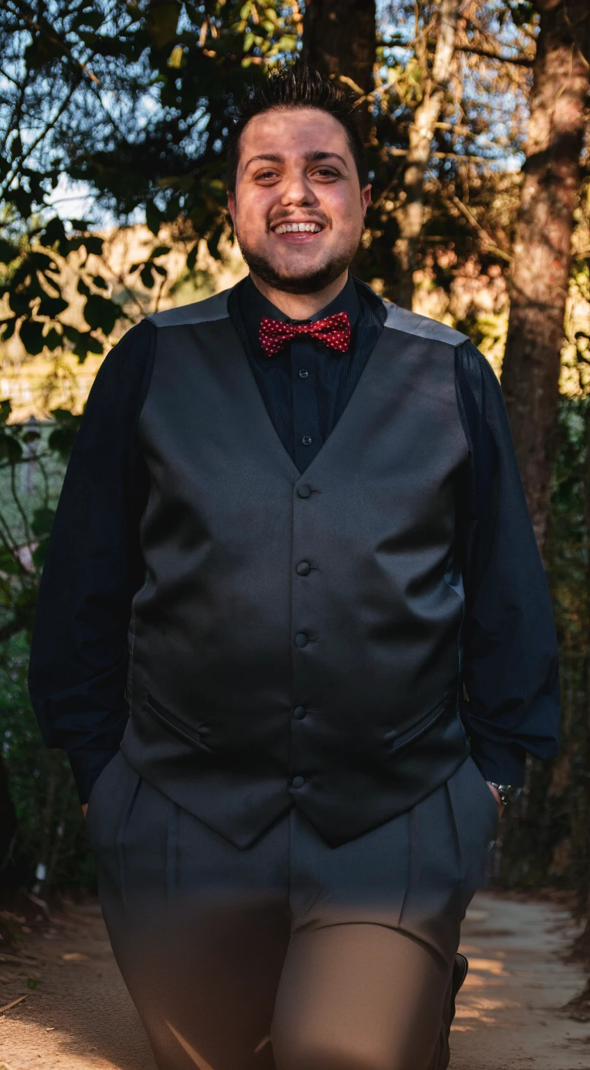 a man in a suit and dress pants and dress shoes