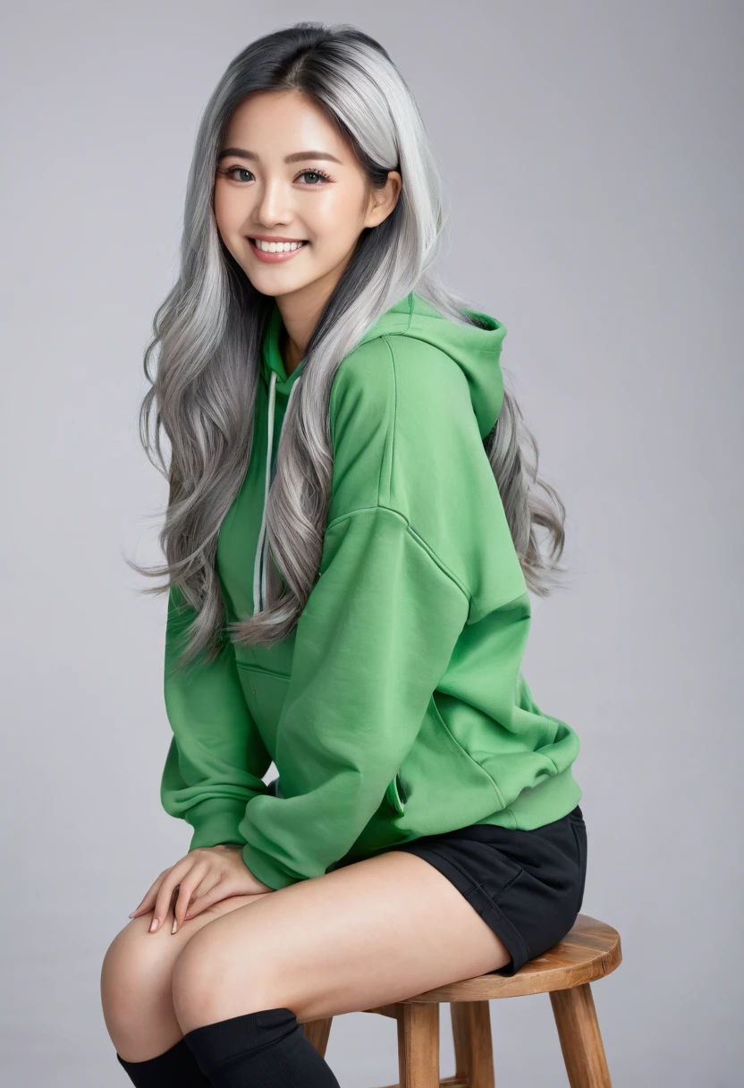 Pretty asian woman, bright silver hair, long hair, green eyes, busty, black shorts and a green hoodie, cute, sitting on a wooden barstool ,empty background, pretty smile