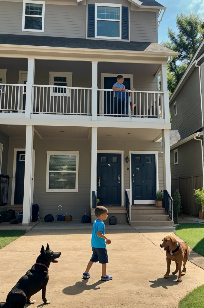 Father and 3 year old son playing ball with his dog in front of their house