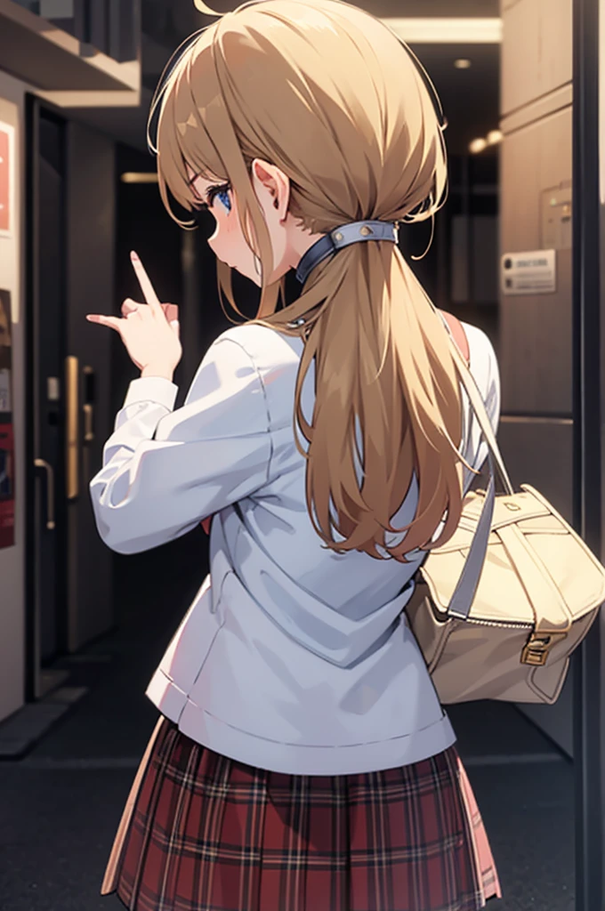 girl looking over her shoulder from behind