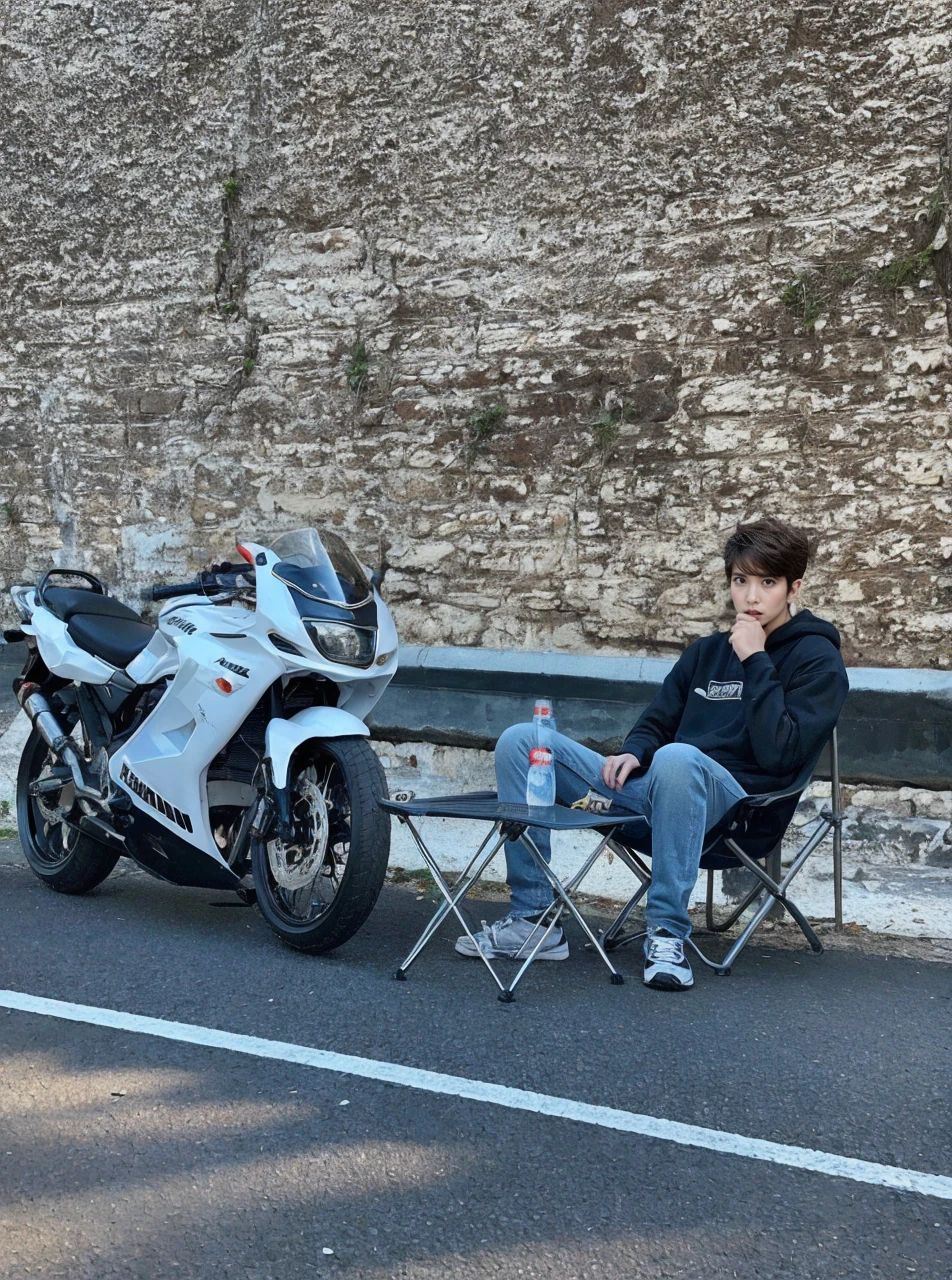 (RAW photo:1.2), (Photorealistic:1.4),Beautiful detailed woman,very detailed eyes and faces, Detailed eyes, ultra - detailed, A high resolution, The is very detailed,best qualtiy,illustratio,unified,8k wallpaper,tmasterpiece,best qualtiy,A boy stood,full bodyesbian,Sunshine Youth,Handsome young man,Wu Yanzu's appearance,Tall guy，short detailed hair,full bodyesbian,brown  hair,Sweatshirt,denim pant,athletic sneakers,buliding