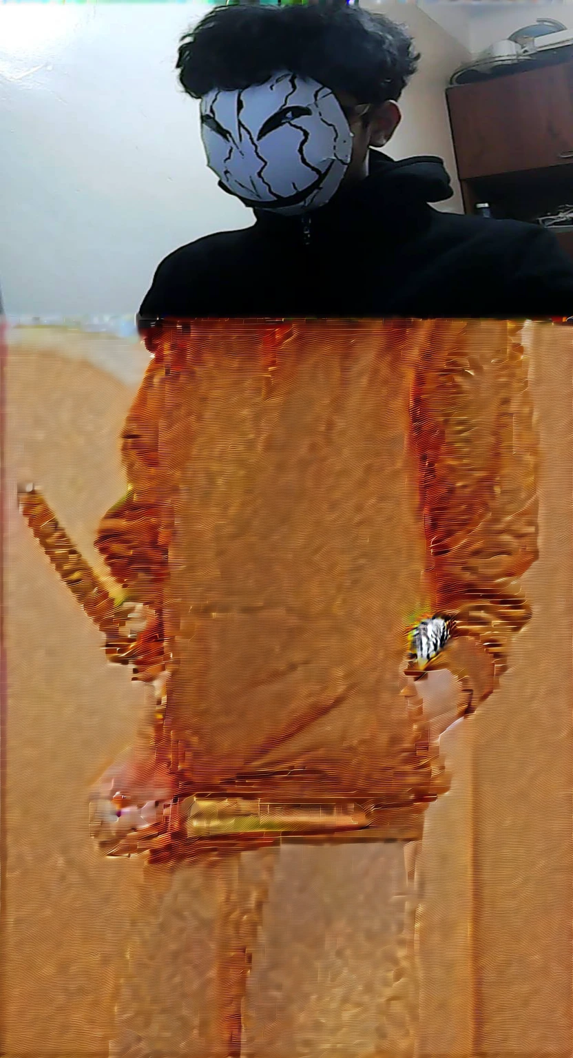 a man with a hoodie holding a black katana