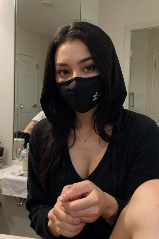 Sexy girl with long black hair wearing a black hooded face mask and a black sweater taking a selfie in the mirror looking sideways and her foot bandaged with a plaster