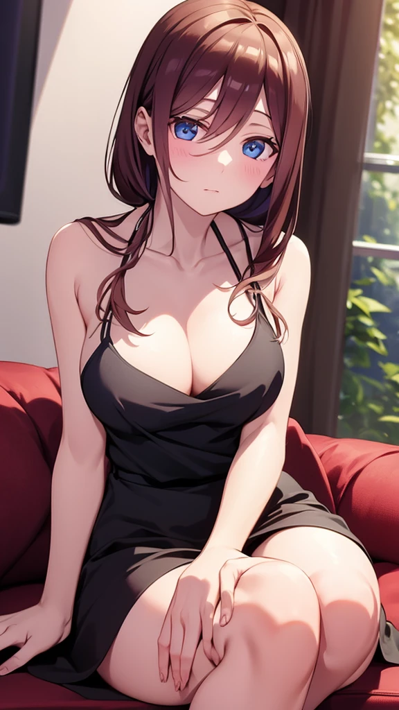 Waiting sitting in a black gala dress 