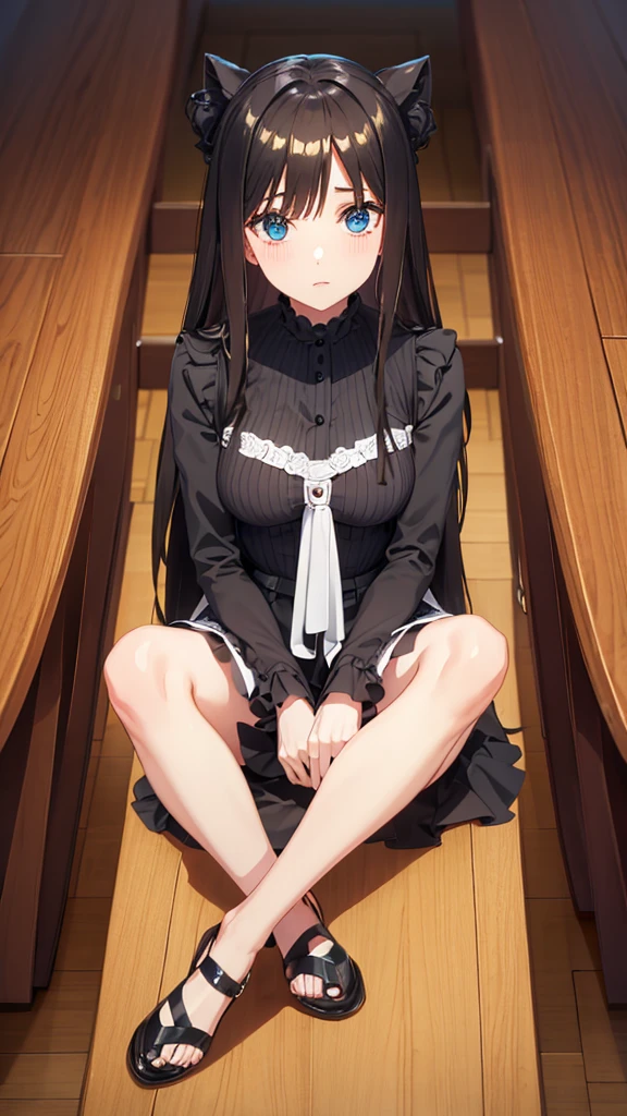 Waiting sitting in a black gala dress