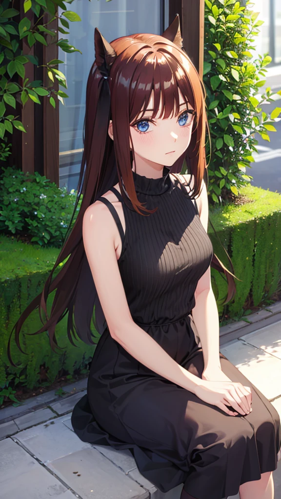 Waiting sitting in a black gala dress 