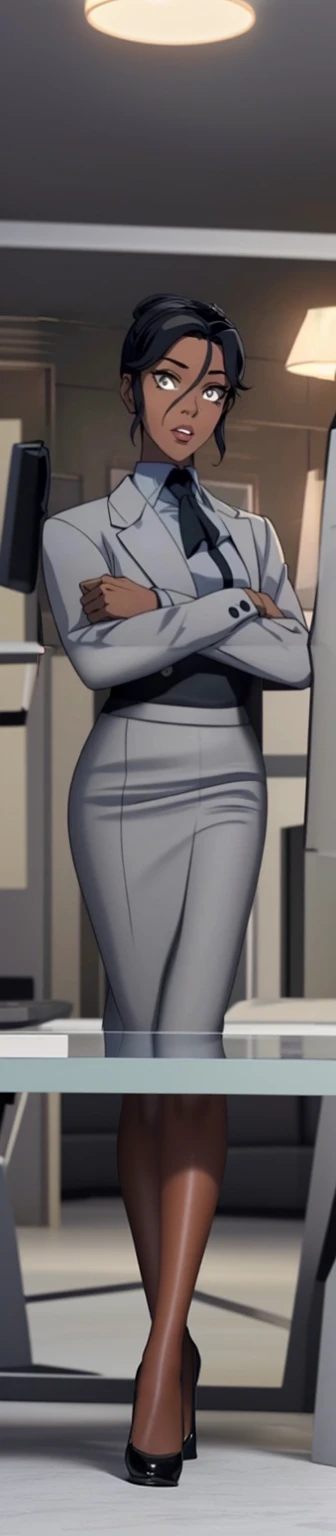 Black skinned business women in a grey skirt suit 