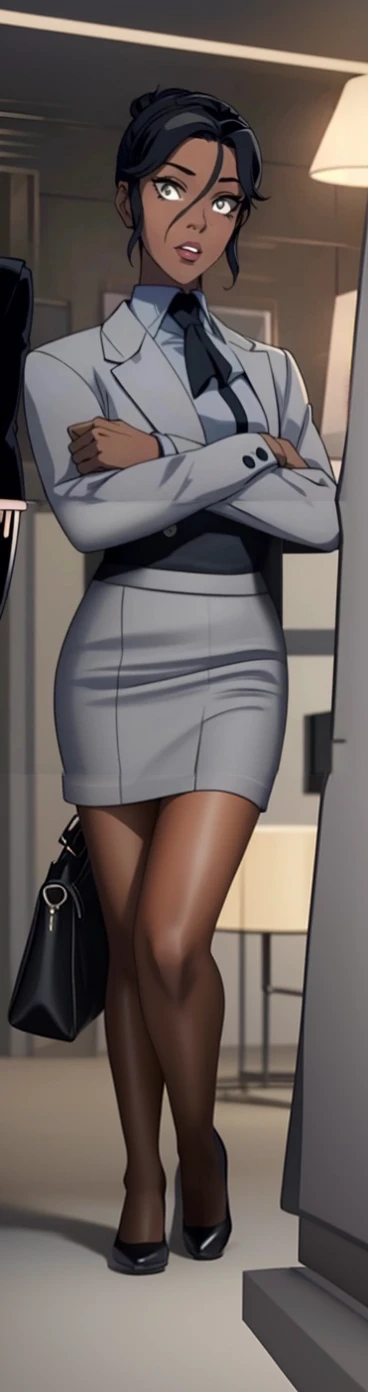 Black skinned business women in a grey skirt suit