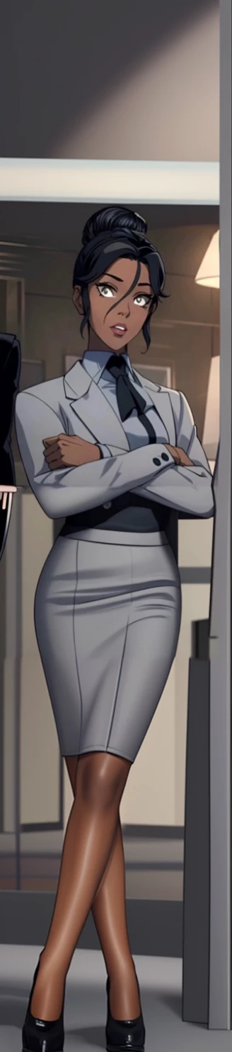 Black skinned business women in a grey skirt suit