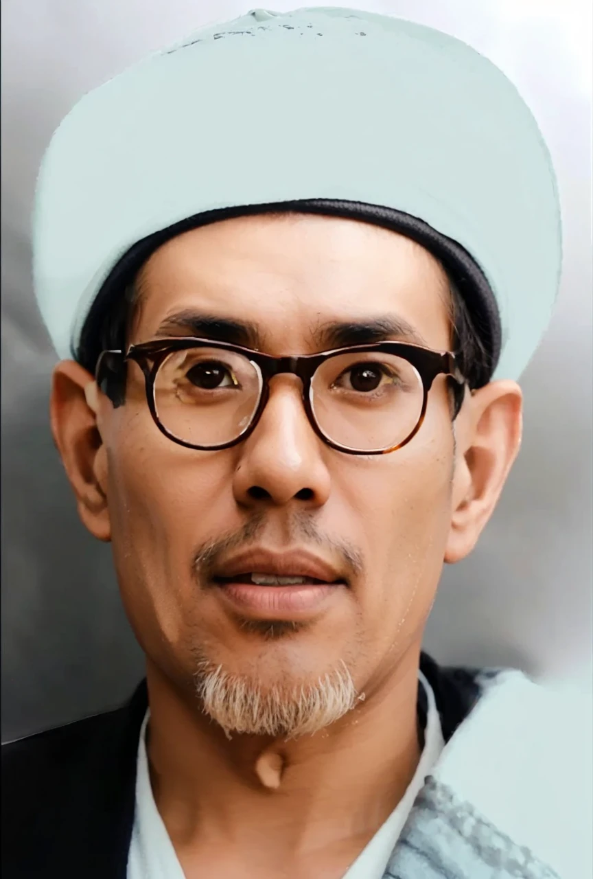 Indonesian Muslim man, brown skin, clean face with slight wrinkles, round eyes, wearing a round white turban, wearing an old colored jacket, there is a scarf over his left shoulder, wearing transparent glasses. HD Quality realistic images.