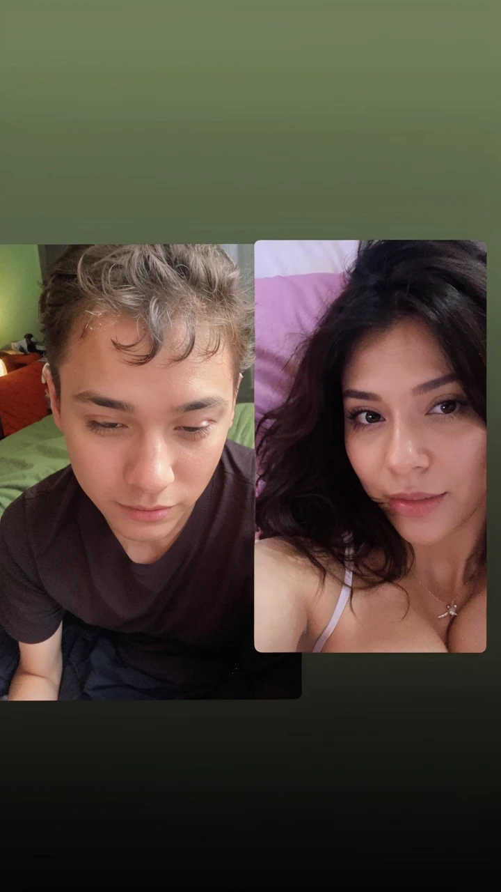 a selfie in bed lying as a couple