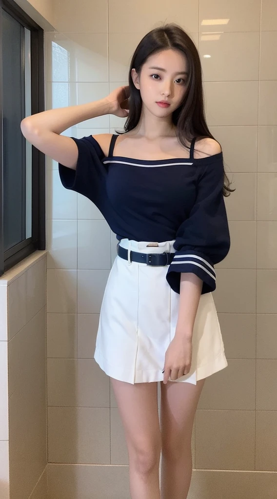 The image depicts an individual standing in a room, with their right arm raised and hand touching the ceiling. The person is wearing a dress reminiscent of a sailor’s uniform, predominantly white with dark blue trim and accents. The dress has off-the-shoulder sleeves and reaches knee-length. There’s also a waist belt-like accessory. The individual’s face is obscured for privacy. The background appears to be a bathroom setting with tiled walls and floors, and there’s a mirror on the opposite wall.