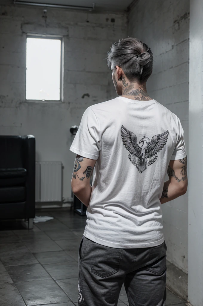 Back Man, gray hair with angel wings in the back , tattoo , tee shirt noir pantalon blanc