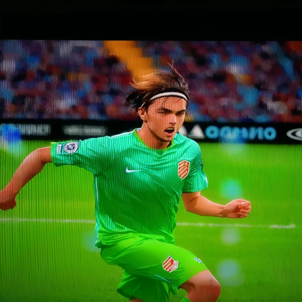 arafed soccer player in green uniform on television playing soccer, 8k scan hq, very very low quality picture, 8 k scan, 8k scan, low quality photo, hq 8k scan, inspired by Pál Balkay, 8k uhd scan, 8k no blur, 8k film scan, 4k scan, 4 k scan