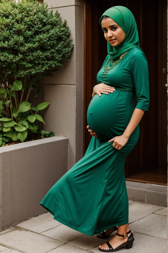 Pregnant Muslim with green dress