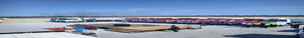 There are many trucks parked in the parking lot, Crates and parts on the ground, Photo showing, Smoke billows on the horizon, Eight thousand. filling of the view, Chiba Yudai, Large-scale battles, On display, Large photos, High-quality photos, 4k photo”, Panorama