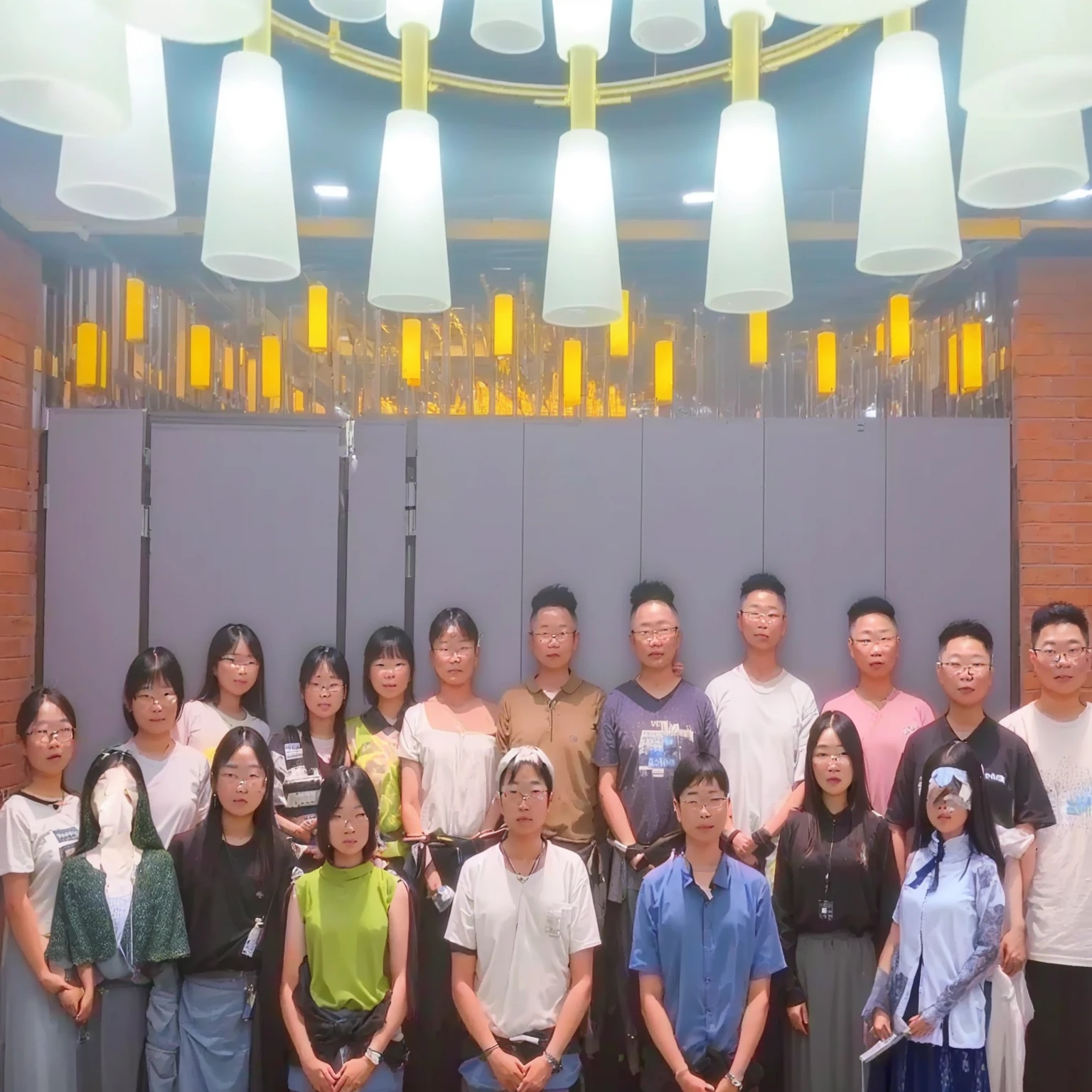 there are many people standing together in a room with lights, group photo, photo taken in 2 0 2 0, f 2. 0, 2 0 2 2 photo, postprocessed), in group photograph, shot on nikon z9, photoshot, 2 d cg, taken with canon 8 0 d, a group of people, trending ,, with many travelers