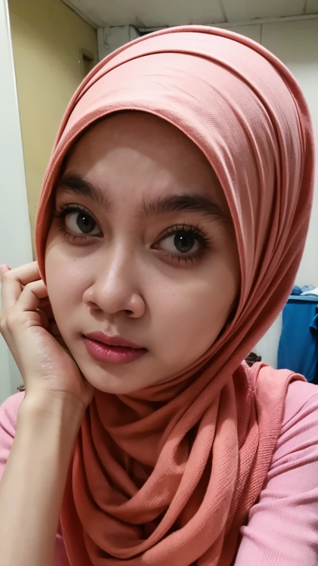 Beautiful and cute woman without makeup wearing hijab selfie in the room with open clothes.