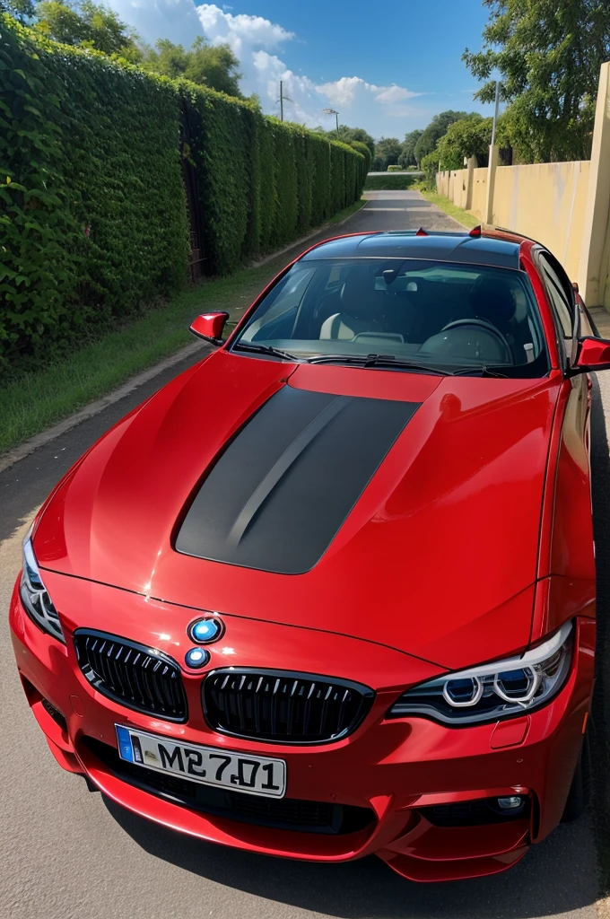 A beautiful red colored BMW car with the name Vicky on its number plate