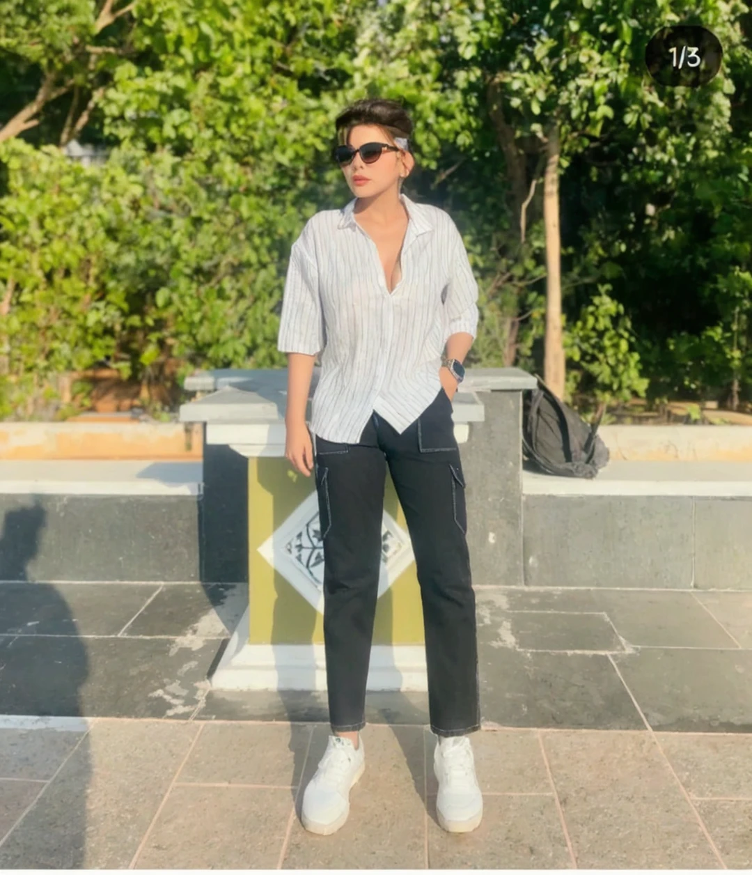 ((Midnight, Best quality, 8k, Masterpiece :1.3)), Whole body, Long legs, Sharp focus :1.2, A pretty woman with perfect figure :1.4, Slender abs :1.1, ((Dark brown hair, Big breasts :1.2)), (White tight tshirt, Jean bib, Standing:1.2), ((Night city view, Rooftop:1.3)), Highly detailed face and skin texture, Detailed eyes, Double eyelid, sunset, darken, backlit, off shoulder