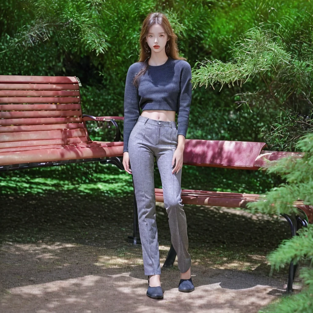 An image of a model wearing the same pants and the same sweater sitting on a bench surrounded by plants and trees with the sky