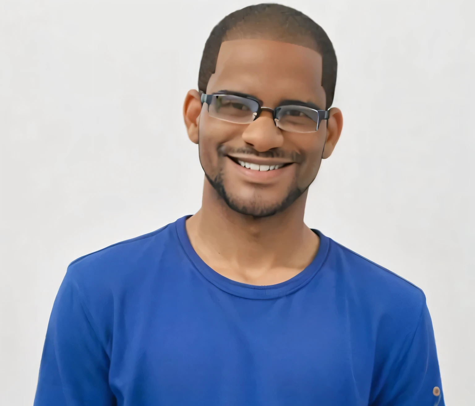 black male, smiling, shaven hair. Eyeglasses, unshaven beard.