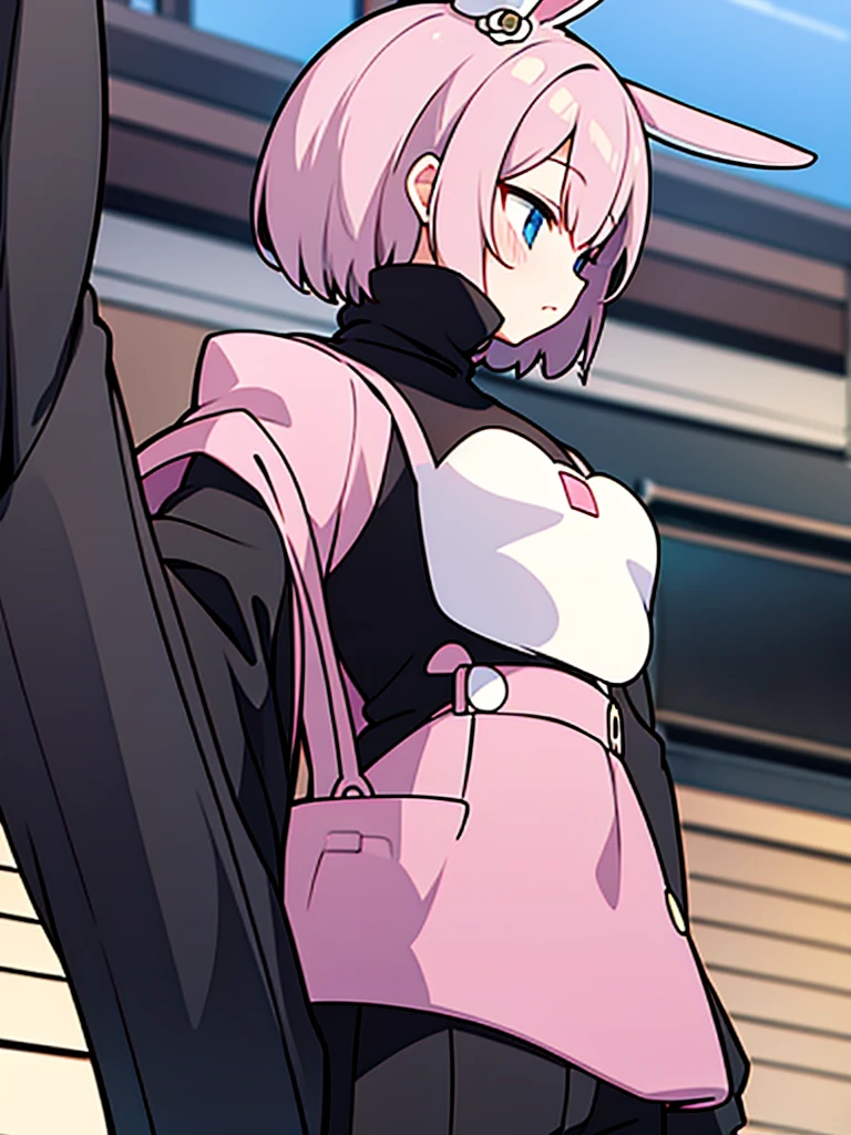 MAN with pink bunny ears with short hair black turtleneck and baggy black pants