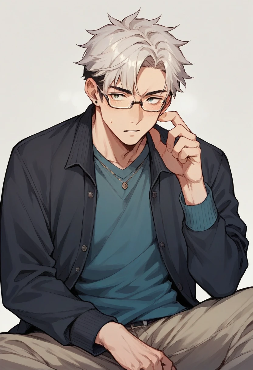 Boy in glasses wearing black cardigan