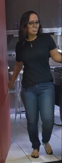 woman in black shirt and jeans standing in kitchen with a dog, middle shot waist up, uhd candid photo of dirty, distant full body shot, black extremely tight jeans, zoomed out full body, standing in a restaurant, wearing jeans, close up to a skinny, low quality video, ( ( ( wearing jeans ) ) ), full body profile camera shot