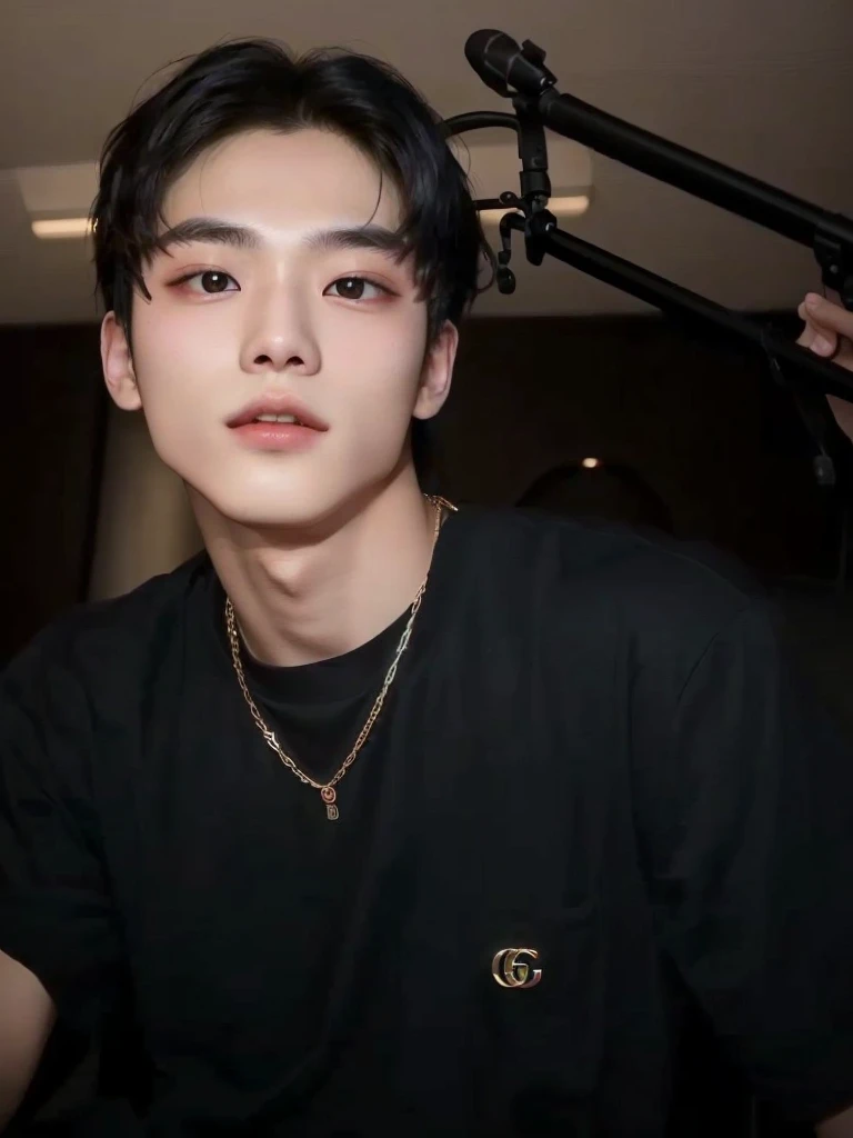 there is a man sitting in front of a microphone with a necklace, cai xukun, Taehyung eating Gucci fries, yanjun chengt, 1 7 year old boy, lean face, he is wearing a black t-shirt, he is about 20 years old, he is about 20 years old, hyung tae, jossi do blackpink
