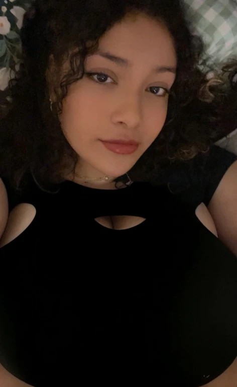 there is a woman laying in bed with a cell phone, taken in the early 2020s, profile image, around 1 , selfie of a young woman, 18 years old, alanis guillen, headshot profile picture, profile pic, 30 years old woman, 3 0 years old woman, her face framed with curls, Big tits, huge tits, no clothes, sexy, cute, minimal clothes, thick, bbw, chubby stomach, thick nipples, nipple piercings, large areola, hard nipples, piercing through shirt, nipples hard through shirt, busty, major cleavage, naked, ripping through top, spilling over sides, bra too tight, giant tits, extra wide hips, upper body zoom in, showing off huge tits, fat stomach, see through top, fat bbw, large areola showing, major cleavage, latina, down to stomach, wide hips, sexy, upper body zoom, thick arm, showing off , top half only, showing only upper, only a bra, showing off cleavage, naked huge tits