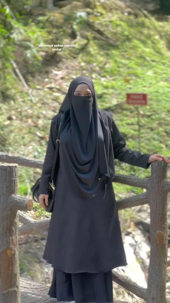 High resolution UHD, Improvement of quality, Soft lighting, Highly detailed, Very detailed on clothes, high quality clothes, Advanced Details, Sharp Focus, High resolution, Big Breasts, Breasts Covered With Hijab and Dress, Real clothes, Real Lighting, Same clothes, Same Clothes With Big Breasts, Big Boob Undershirt Covered, Biggest  Under Niqab
