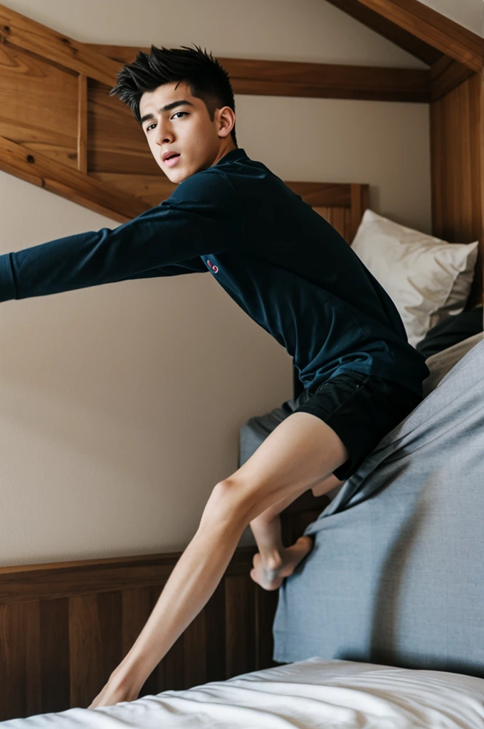 Boy falling out of bed