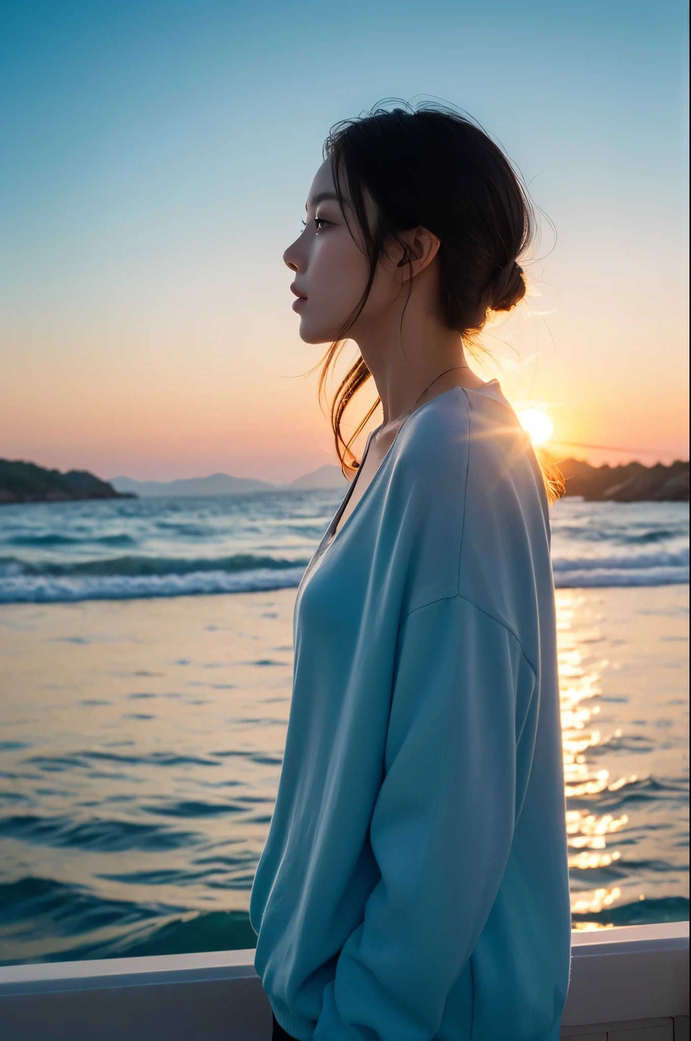 Vivid sunrise over the calm sea, female profile, Contrast between bright sky and deep blue sea illuminated by the golden light of the sun