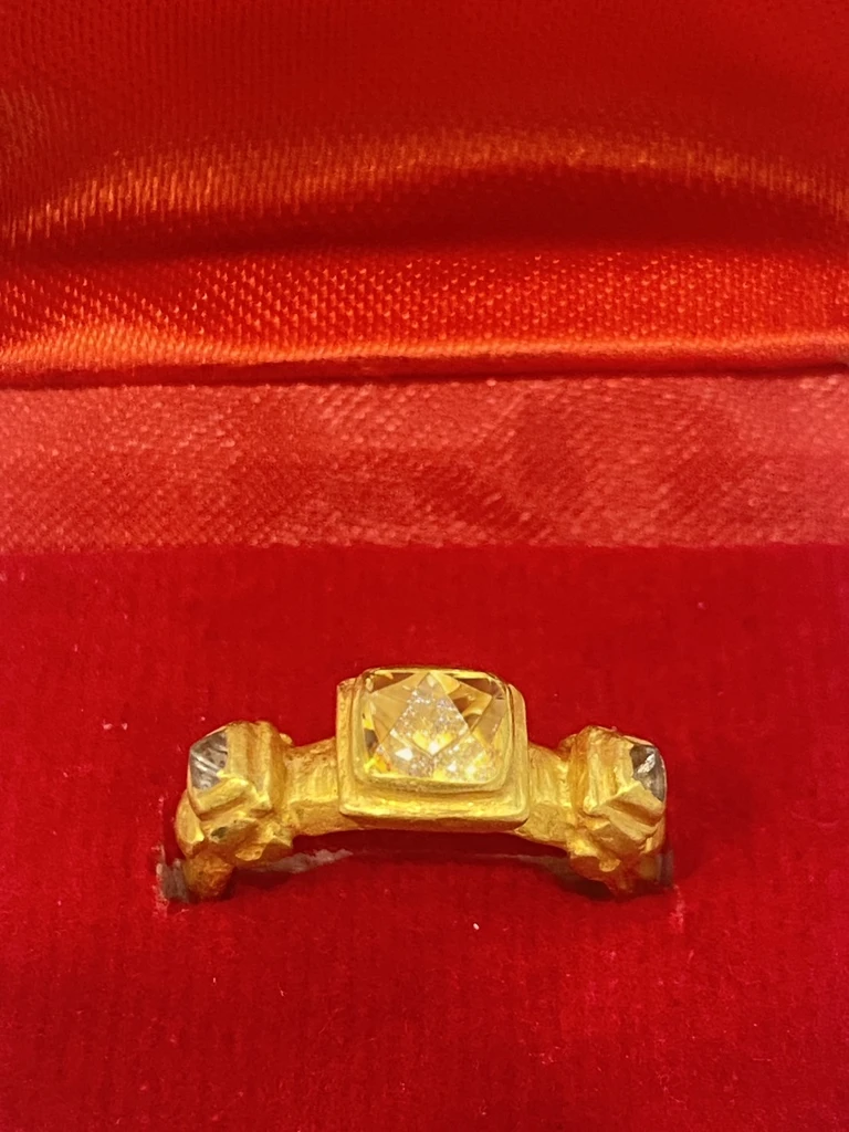 a rough cutting diamond, dull shining, old and normal grade