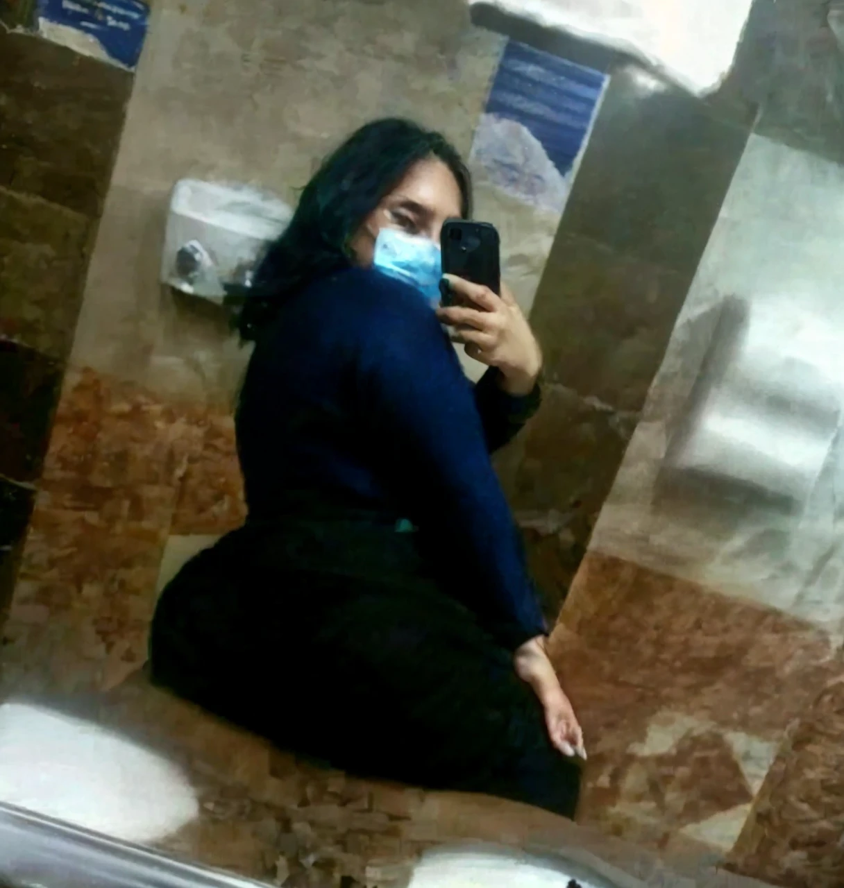 A beautiful chubby woman, an extremely curvy woman with a huge butt, a plus-size woman, detailed facial features, beautiful eyes, detailed lips, luxuriant hair, full figure, voluptuous body shape, alluring pose, warm lighting, vibrant colors, photorealistic, (best quality,4k,8k,highres,masterpiece:1.2),ultra-detailed,(realistic,photorealistic,photo-realistic:1.37),volumetric lighting,dramatic shadows,dramatic lighting,cinematic composition