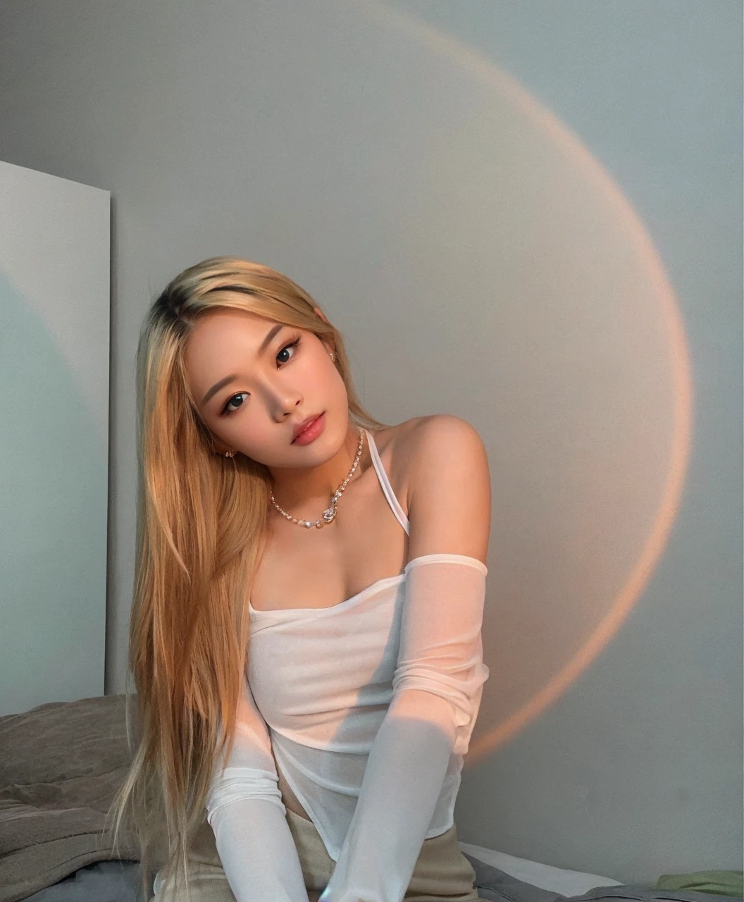 Asian model girl with blonde hair, fair skin and large black expressive and engaging eyes. Her features are delicate, with subtle cheekbones, a small nose and full, rosy lips. Her expression combines sweetness and seduction, resulting in a cute, sexy and beautiful appearance.