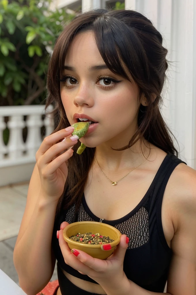 jenna_ortega she eating pepper