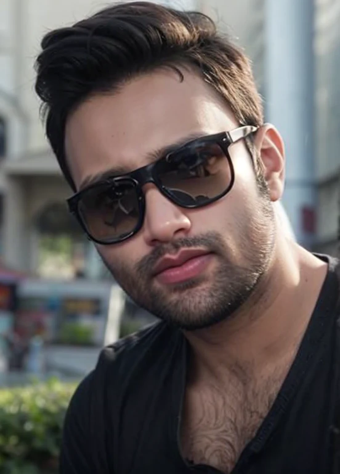 A beautiful young bearded man with highly detailed skin.black hair.