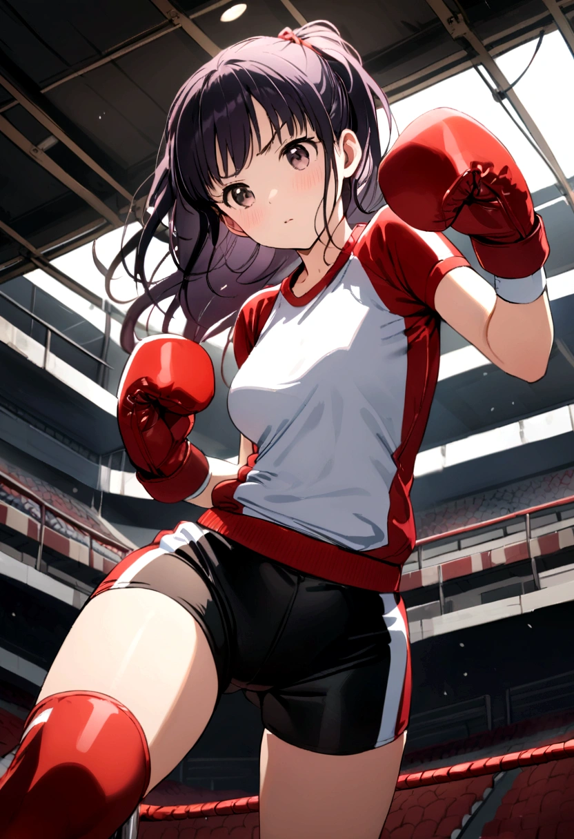 Kanao Tsuyuri in a boxing uniform stands in the center of the ring wearing tight shorts and a top and gloves